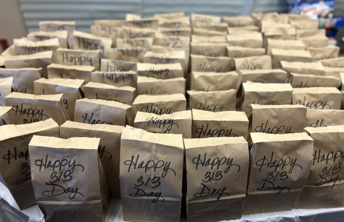  A paper bag labeled 313 